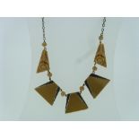 An Art Deco chrome and Galalith Necklace, formed of five beige galalith sections, two triangular