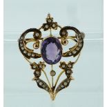 A 9ct openwork Art Nouveau style Pendant, set with oval amethyst and seed pearls, drop missing.