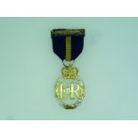 Army Emergency Reserve Decoration, 1952-1967, with ribbon and bar, the reverse inscribed 1964.