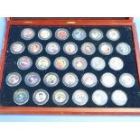 Elvis Interest; 'The complete Movies colorized half dollars', in fitted presentation case, each coin