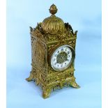 An late 19thC French brass Mantel Clock, retailed by E. Sermon, Torquay, of ornate domed and pierced