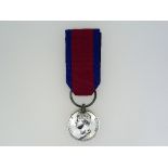A Waterloo medal, 1815, to "William Lindsay, Royal Artill. Drivers.", with ribbon, together with