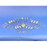A quantity of silver Flatware, including a near matched set of six Edwardian silver forks,