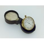 A late 19thC cased Pocket Barometer / Thermometer, comprising aneroid barometer in one side of