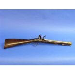 A late 18thC Blunderbuss, by Robert Walker, with 15-inch brass barrel, with maker's mark for