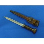 A rare W.W.2 period Dutch army fighting Knife, with 8-inch blade and original leather scabbard,