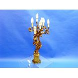 A French Louis XV-style gilt metal seven light electolier, the seven naturalistic flowering