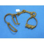 A 19thC set of wrought iron Slave Leg Shackles, probably African.