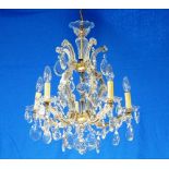 An early 20thC continental crystal cut glass five-branch Chandelier, the moulded glass 'S' shape