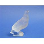 A Lalique glass Partridge, signed on base, chip to underside edge of base, 7in (18cm) high.