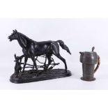 A mid 20th Century Russian cast iron horse on naturalistic mound, 28.5cm high x 37.5cm long, sold