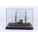 A glass cased model of a two master steam / sail ship, case: 50 x 23 x 36.5cm high.