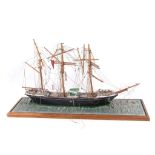 A model of a 3 masted clipper on sea effect base, 60cm long x 35cm high.