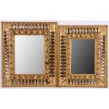 A pair of attractive, late 19th Century, gilded carved wood wall mirrors, both having pierced