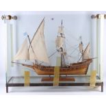 A glass cased model of 'Mistique', a French merchant ship c.1750, case: 90cm high x 72m depth.