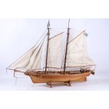 A model of a 19th Century twin master schooner 'Baltic', on stand, 86cm long x 60cm high.