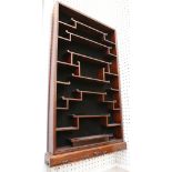 A Chinese hardwood wall hanging display cabinet, with open shelves, 92cm high.