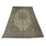 A Persian Yazd carpet, 3.65m x 2.40, condition rating A.