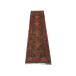 A Persian Senneh runner, West Iran, 3.15m x 0.85m, condition rating A.