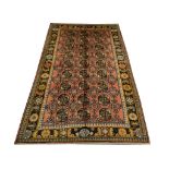 A Persian Bokhara carpet, North East Iran, 3.05m x 1.97m, condition rating A.