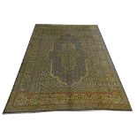 A Persian Kerman carpet, 4.00m x 3.00m, condition rating B.