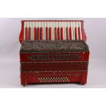 A Casali Vernia piano accordion, red marble effect casing etc.