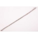 A brilliant cut diamond line bracelet, composed of forty two brilliant cut diamonds weighing approx.