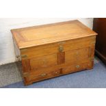 An Indonesian hardwood and brass inlaid coffer.