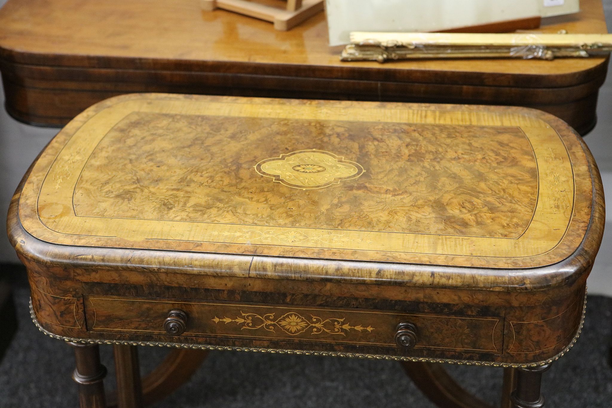 A fine mid 19th Century Victorian burr-walnut game table, the hinged top inlaid with scrolling - Image 2 of 3