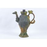 An antique 17th / 18th Century copper Chinese - Tibetan coffee pot, having organic handle, no cover,