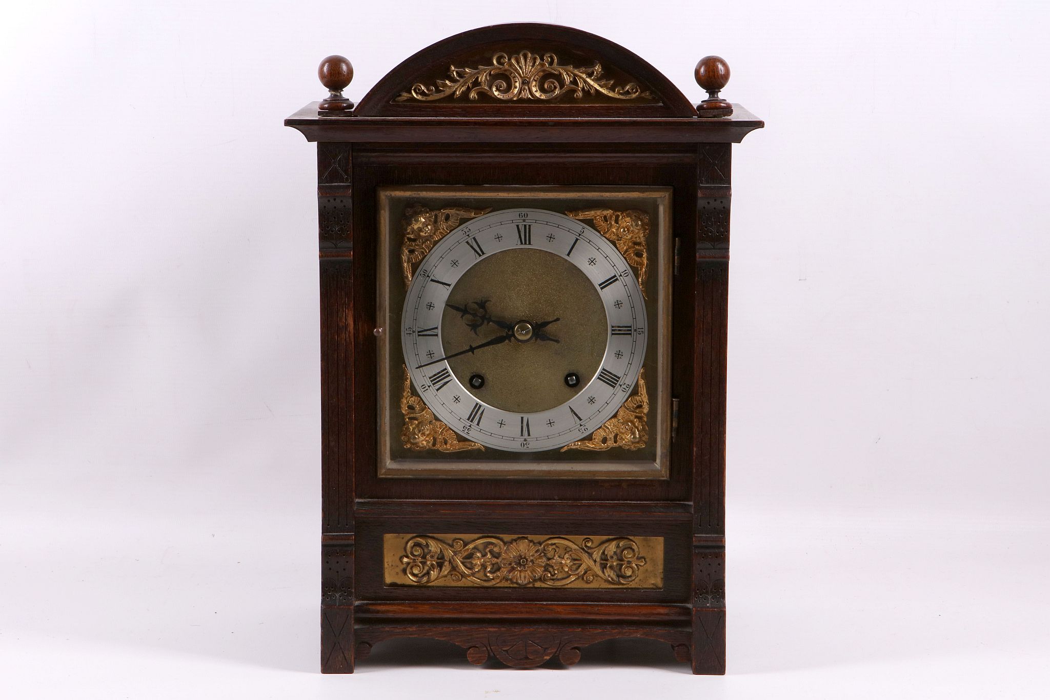 A late 19th century oak and gilt brass mounted mantel clock, the movement stamped for Winterhalder