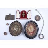 A quantity of relics and travelling votive items (8).