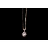 An 18 carat white gold and solitaire diamond pendant, set round cut diamond of approx. 0.10