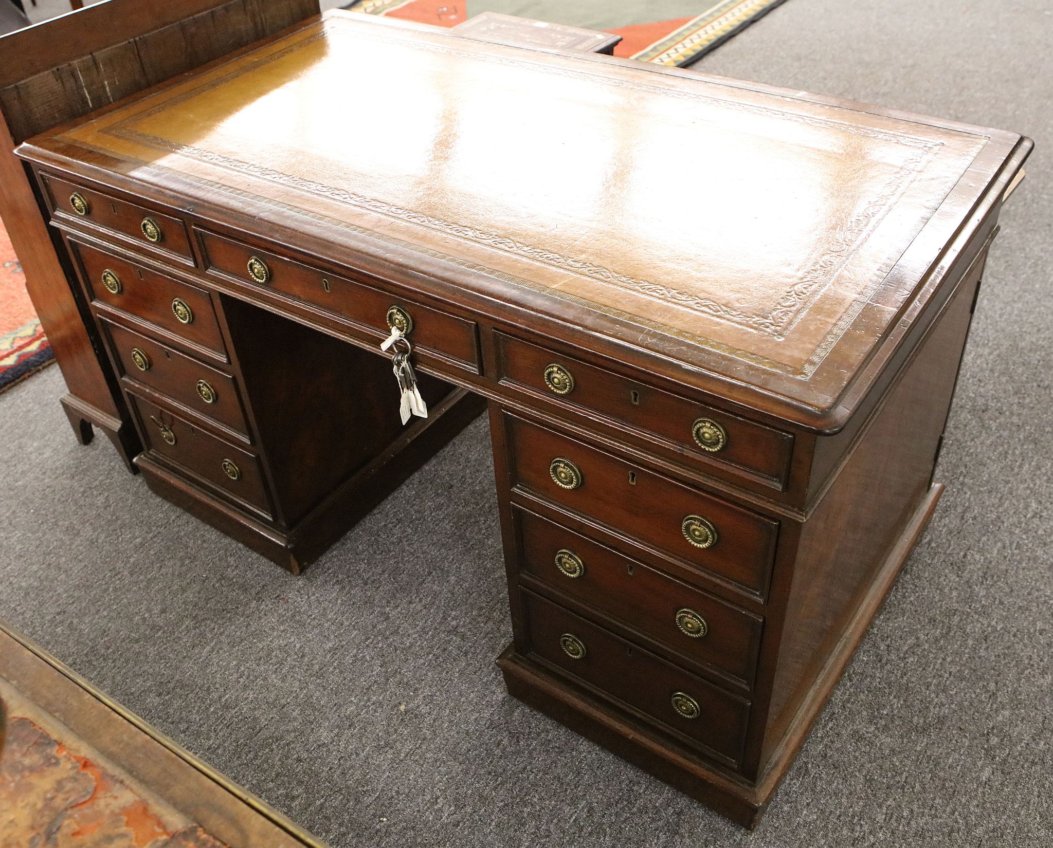 A Victorian mahogany twin pedestal partner's desk, one side having 3 frieze drawers over 3 drawers