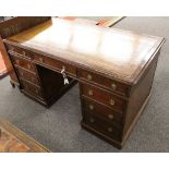 A Victorian mahogany twin pedestal partner's desk, one side having 3 frieze drawers over 3 drawers