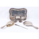 A collection of hallmarked silver items to include a small tray, Birmingham 1925, an Art Nouveau