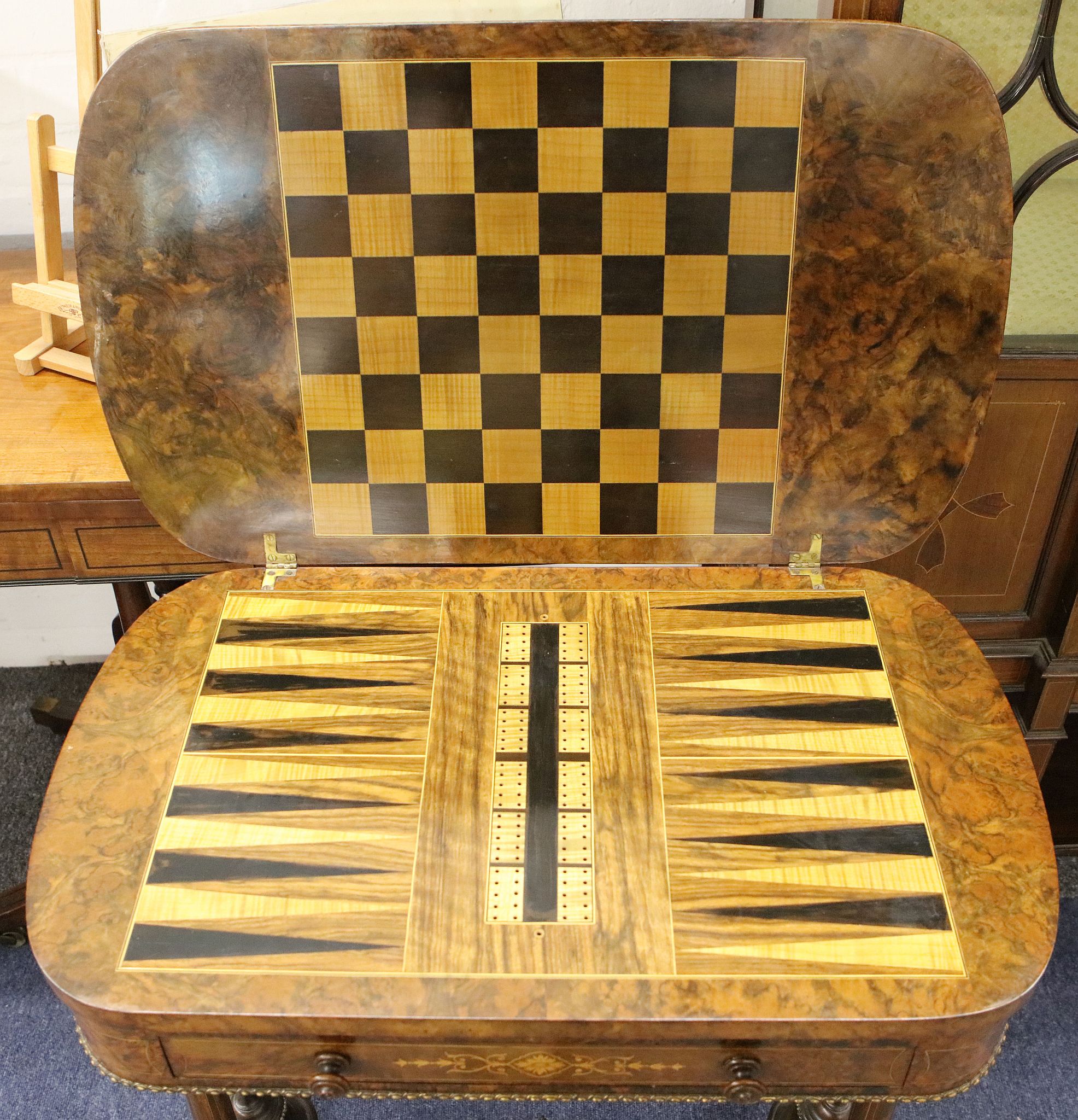 A fine mid 19th Century Victorian burr-walnut game table, the hinged top inlaid with scrolling - Image 3 of 3