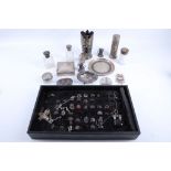 A mixed collection of silver and white metal items, to include silver topped jars, a box, rings