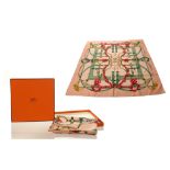 HERMES 'GRAND MANEGE' SILK SCARF, designed by Henri d'Origny, on pink ground, 90cm x 90cm, with box