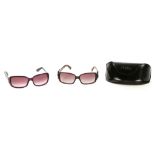 TWO PAIRS OF SUNGLASSES, to include a Fendi 'buckle' design, model number FS383, with case, and a