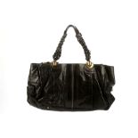 CHLOE BLACK LEATHER SHOULDER BAG, of large proportions with braided shoulder straps, gilt metal