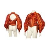 CHRISTIAN LACROIX STRIPED BLOUSE, 1990s, in shades of red and orange, with long sleeves and open