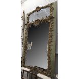 A highly decorative 19th Century French, green painted and giltwood wall mirror, with well carved