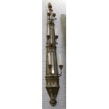 A pair of decorative antique French six light slender wall sconces, with mirror backs and