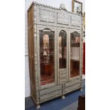 A 19th Century Syrian mother of pearl inlaid 5 panel display cabinet, the outer panel hinges