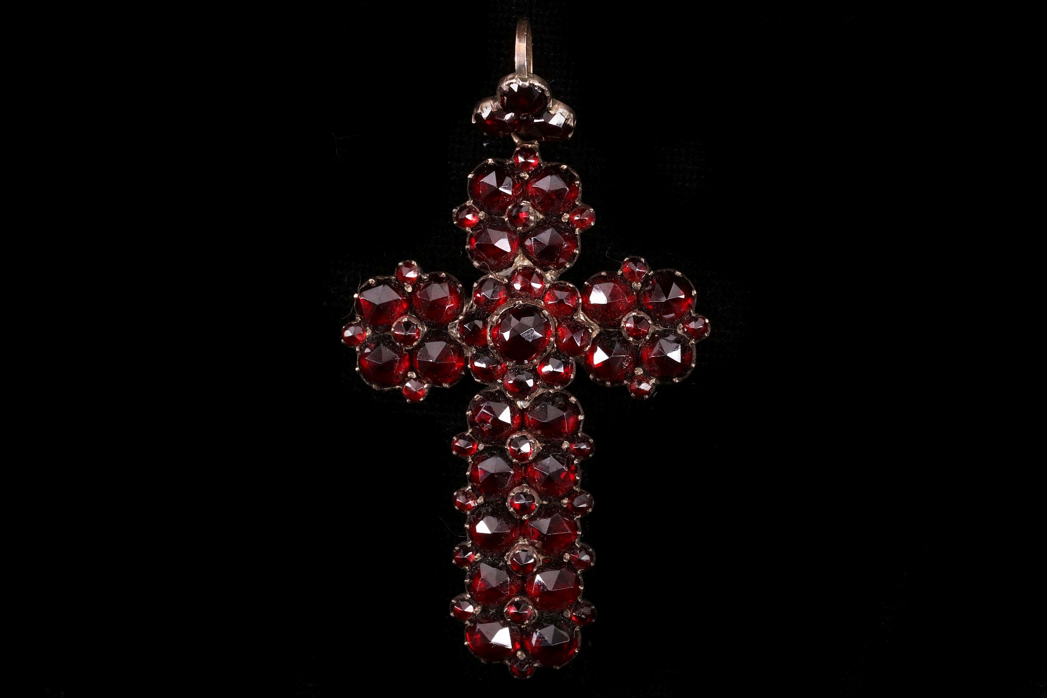 An antique Bohemian garnet cross pendant circa 1970s