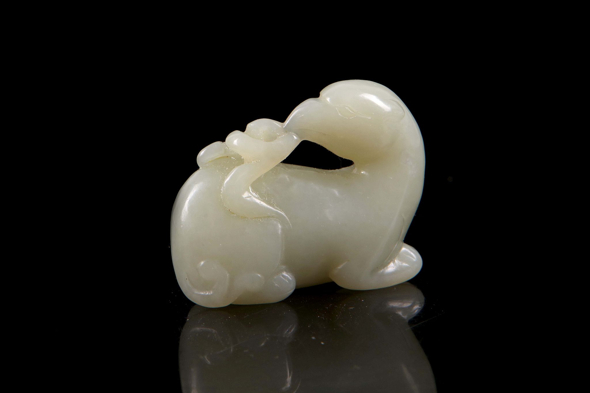 A Chinese jade carving of a mythical beast with bird of prey head. - Image 2 of 2