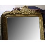 A large sized giltwood and gesso overmantle wall mirror with foliage design, 173 x 125cm.