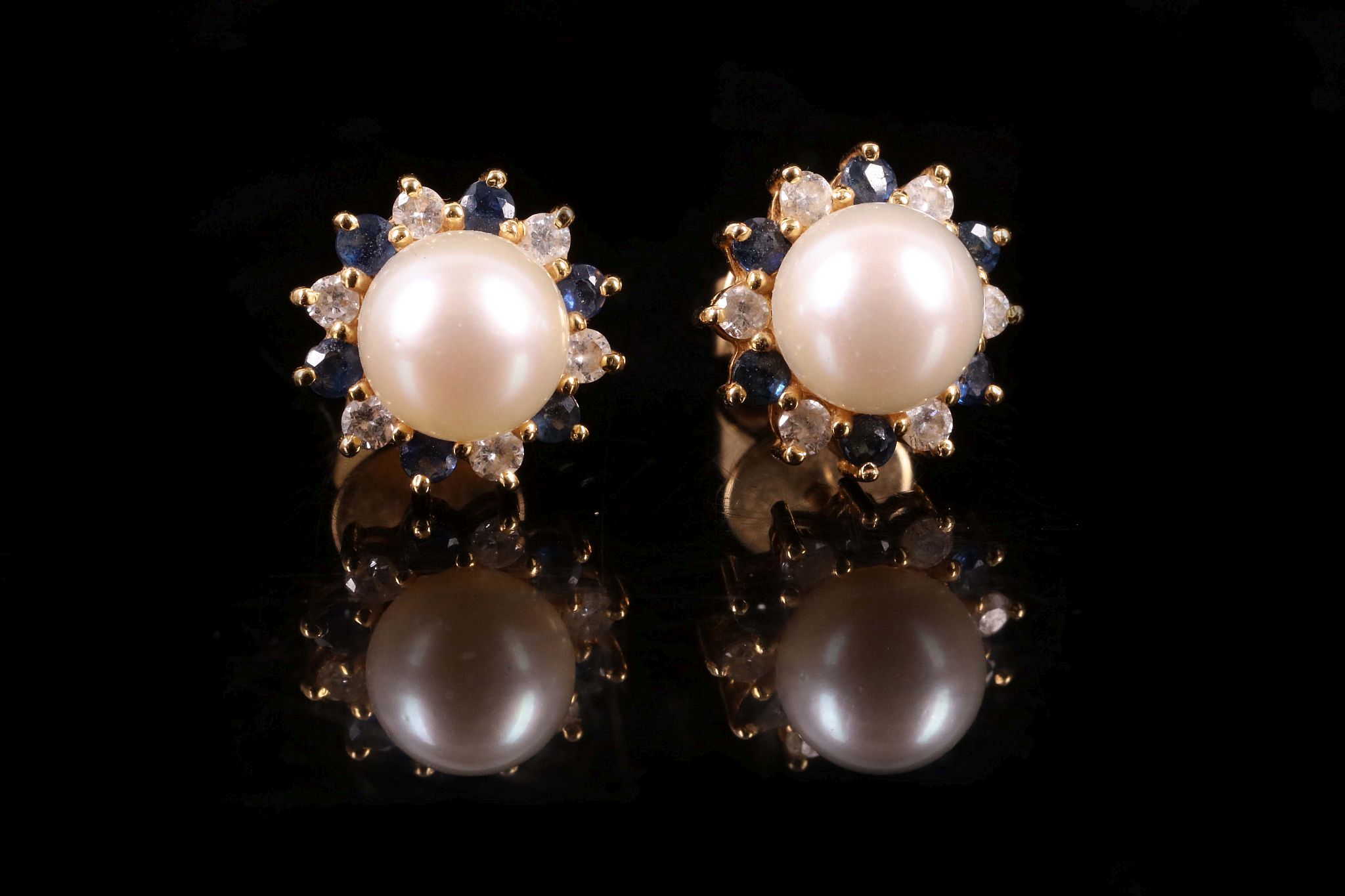 A pair of cultured pearl, sapphire and diamond cluster earrings; and three pairs of cultured pearl