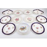 An Aynsley porcelain part dessert service together with a set of seven pierced ribbon plates, both